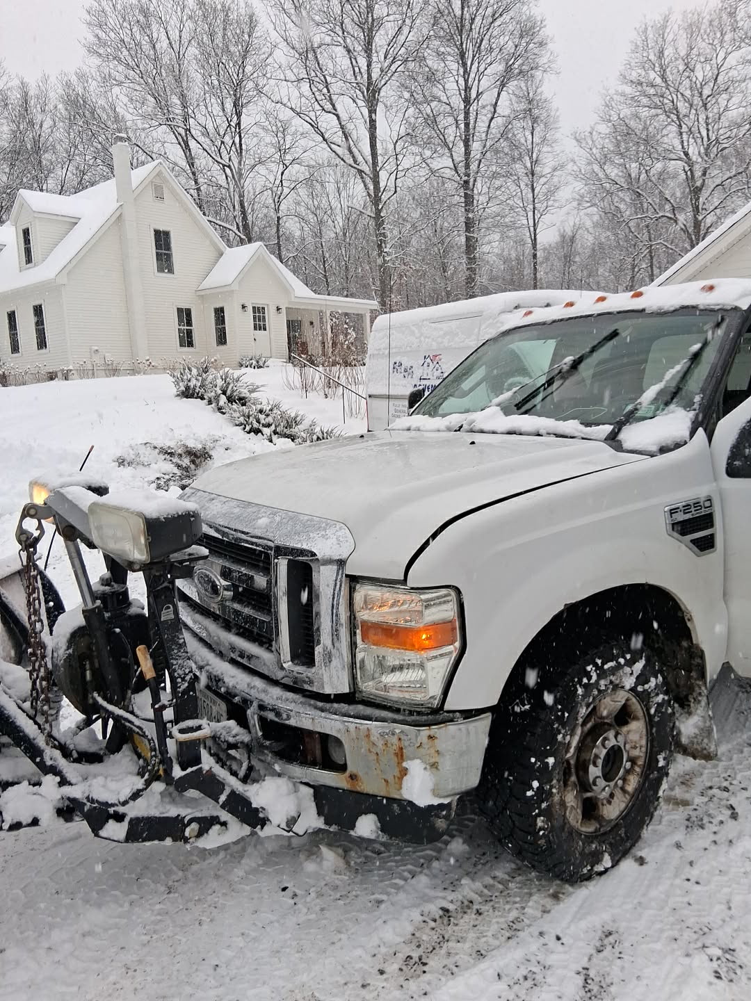 Professional snow plowing service - Ford F-250 plow truck